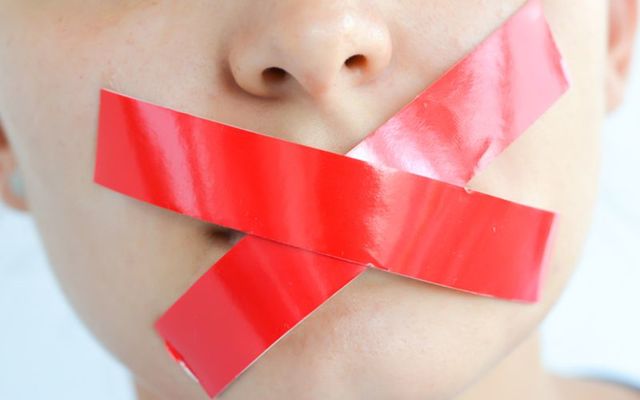The Irish High Court has confirmed sanctions against a teacher accused of taping students mouths shut