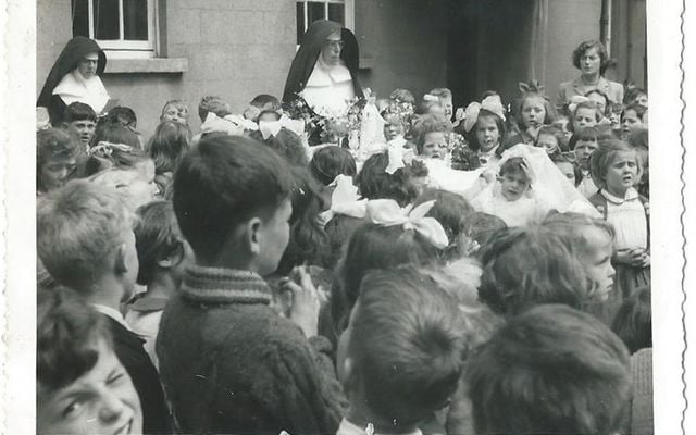 Catholic nuns oversee a school yard in Ireland in 1957.