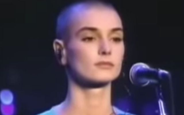 Sinéad O\'Connor on stage at Madison Square Garden for the Bob Dylan anniversary concert in 1992.