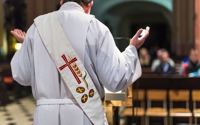 Priest saying Mass.