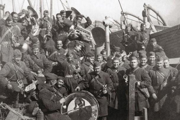 The band of the US 165th Infantry, formerly the 69th Infantry Regiment, returns from service in Europe during World War I, 1918. The regiment is based in New York and is largely made up of Irish-Americans. 