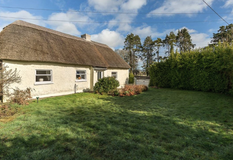 200-year-old Irish thatched cottage is the stuff of retirement dreams