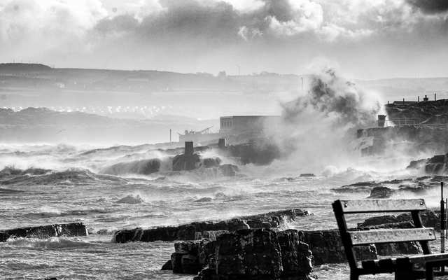 Storm waves batter the Blue Pool Portrush, Northern Ireland. 