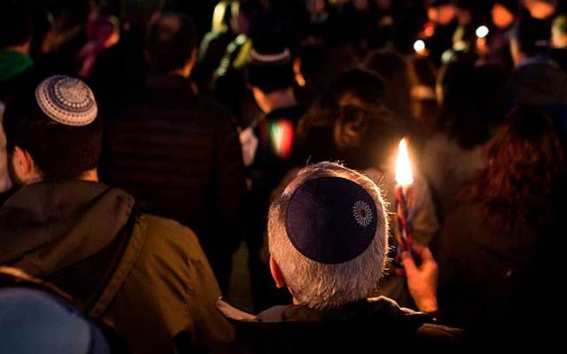 Members and supporters of the Jewish community come together in front of the White House for a candlelight vigil, in remembrance of those who died during a shooting at the Tree of Life Synagogue in Pittsburgh on October 27, 2018.