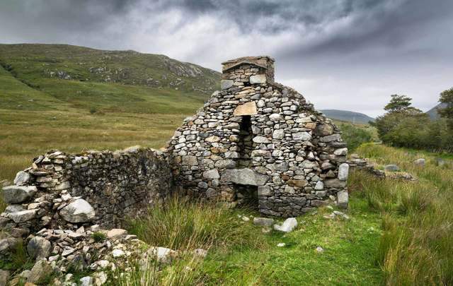 The ruins of a Famine cottage in Donegal, Ireland. this was one of many houses in an abandoned village in an isolated part of the mountains.