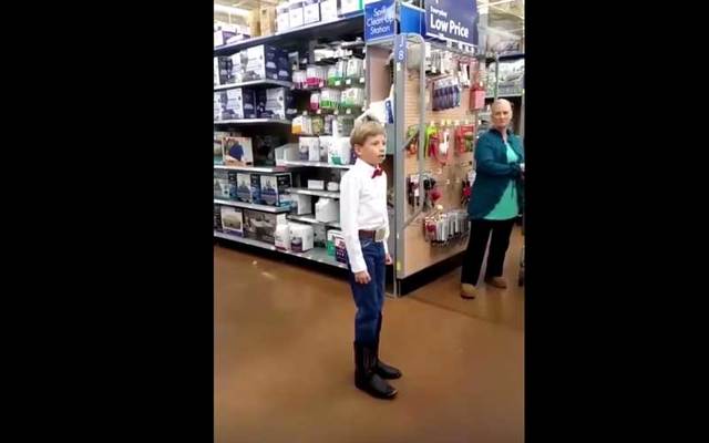 Mason Ramsey, 12, performing Hank Williams\' \"Lovesick Blues\" in a Walmart in Illinois.