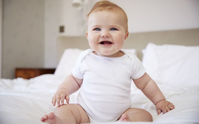 This baby is all smiles about the top Irish baby names of 2018