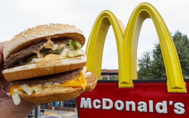 A McDonald\'s Big Mac, their signature sandwich is held up near the golden arches at a McDonalds\'s August 10, 2015, in Centreville, Virginia.