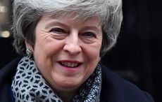 Theresa May's government wins no confidence vote