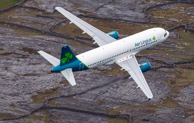 An Aer Lingus plane, with the new 2019 livery, flying over the Aran Islands, off Galway, en route to JKF airport in New York.