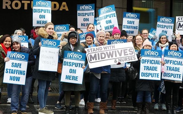 Nurses striking outside the Rotunda Hospital, in Dublin\'s city center.