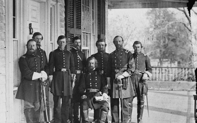Timothy O\'Sullivan\'s photograph of Gen. Isaac Stevens (seated) and staff. 