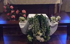 A forgotten child in a shoebox coffin is lifted up by love