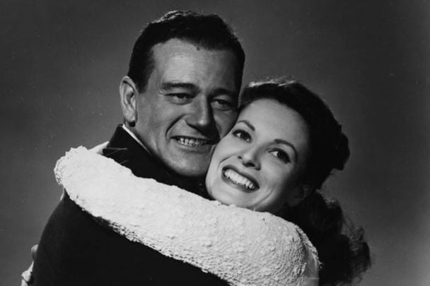 Maureen O\'Hara with John Wayne in a publicity still for \"The Quiet Man.\"
