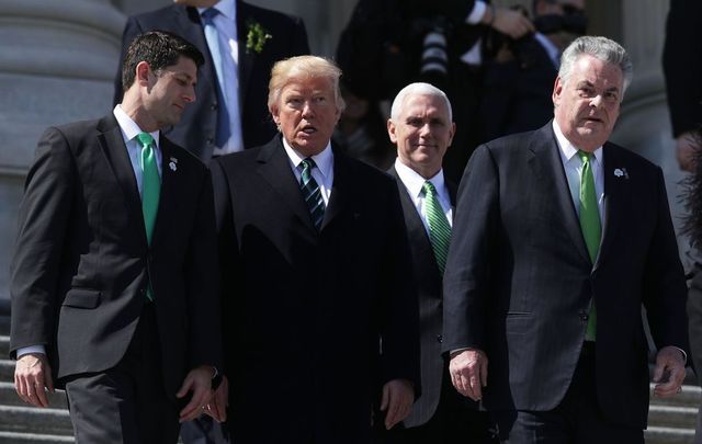 U.S. President Donald Trump (2nd L), former House Speaker Paul Ryan (R-WI) (L), Vice President Mike Pence (2nd R) and Rep. Peter King (R-NY) (R) walk down the House east front steps after the annual Friends of Ireland luncheon at the Capitol March 16, 2017 in Washington, DC.