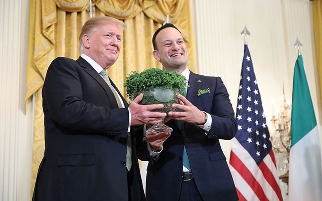 US President Donald Trump receives the traditional shamrock from Irish Leader Leo Varadkar on St. Patrick\'s Day 2019.