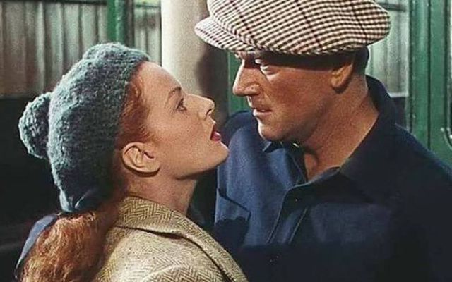 Maureen O\'Hara and John Wayne\'s famous embrace at the railway station in The Quiet Man.
