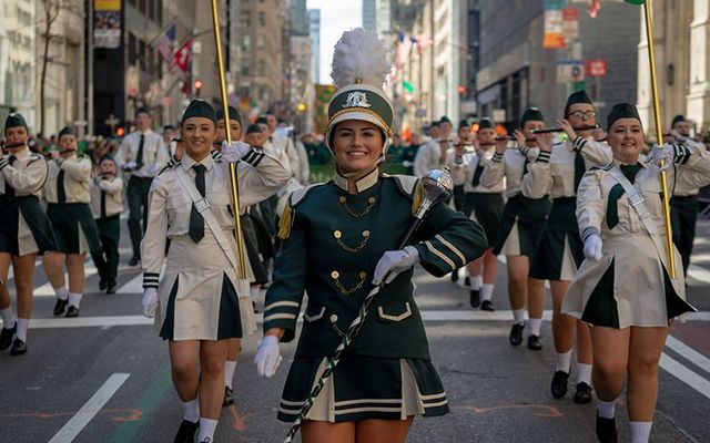 Cheerleaders marching in the New York St. Patrick\'s Day Parade 2019.