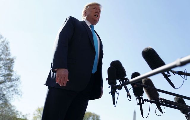 U.S. President Donald Trump speaks to members of the media prior to his departure from the White House on April 10, 2019, in Washington, DC. President Trump will sign an executive order on energy and infrastructure during his visit at the International Union of Operating Engineers International Training and Education Center in Crosby, Texas.