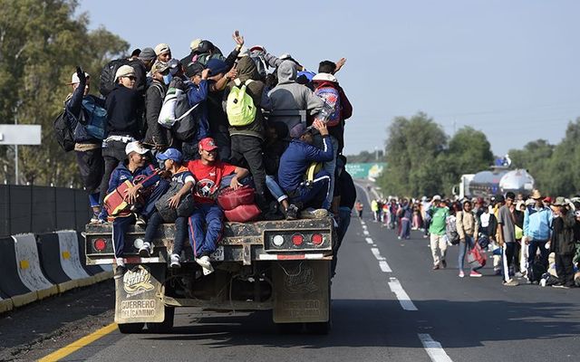 Immigrant caravan approaching the Mexican border to the United States.