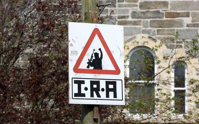 An Irish Republican Army (IRA) sniper warning sign over-looking the Bogside area of Derry in Northern Ireland.