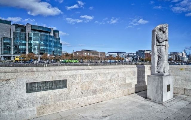 The Matt Talbot memorial statue at the Talbot Memorial Bridge in Dublin\'s City Centre.