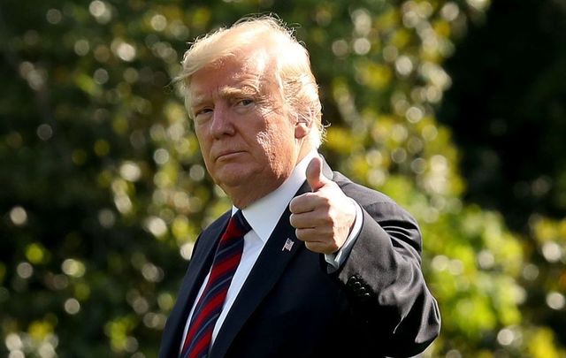 U.S. President Donald Trump gives a thumbs up as he walks toward Marine One while departing from the White House on May 16, 2019, in Washington, DC.