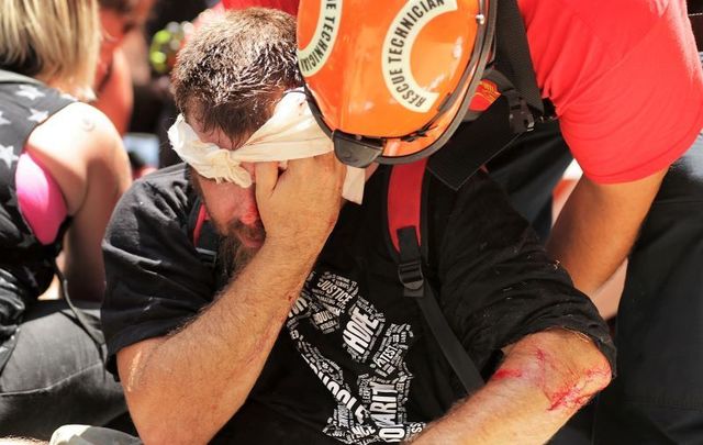 Rescue workers tend to a man injured in the violence during 2017\'s \'Unite the Right\' rally in Charlottesville.