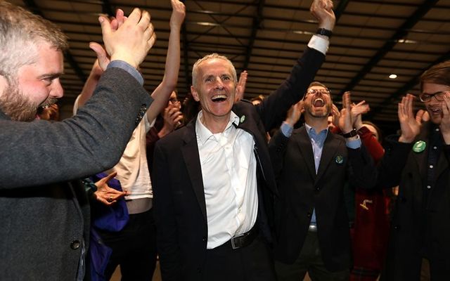 Ciaran Cuffe, Green Party Dublin candidate for Europe, celebrates his win at the election counting center, at the RDS, in Dublin. 
