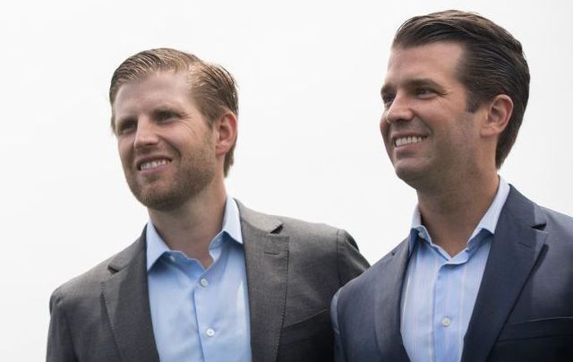 Eric Trump and Donald Trump Jr. attend a ribbon-cutting event for a new clubhouse at Trump Golf Links at Ferry Point, June 11, 2018, in The Bronx borough of New York City.