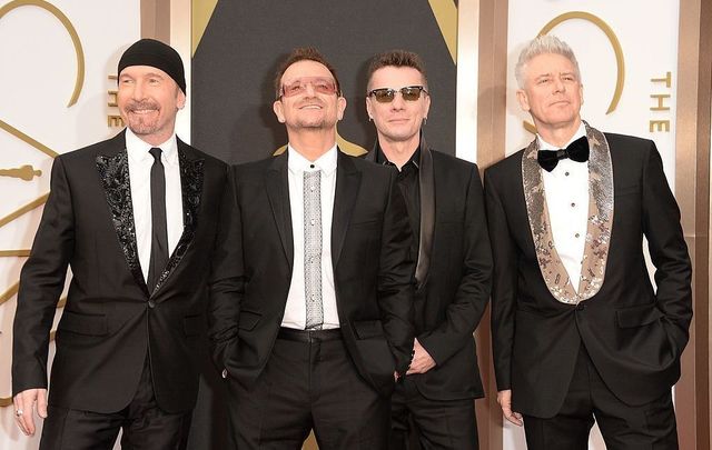 Musicians The Edge, Bono, Larry Mullen Jr. and Adam Clayton of U2 attend the Oscars held at Hollywood & Highland Center on March 2, 2014, in Hollywood, California.