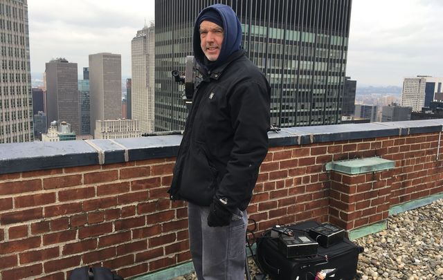 Not one for resting on his laurels, Marcus has started a new project which should last six-and-a-half years - filming the demolition and rebuilding of the JP Morgan headquarters in New York. He is pictured filming the JP Morgan building from across Park Avenue on a frigid January morning this year. 