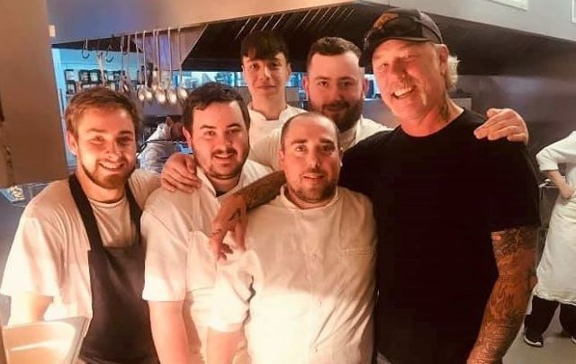 Metallica lead singer James Hetfield with some of the staff at Vaughan\'s Anchor Inn on Monday.