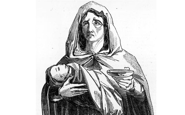 A woman begging with her child in Clonakilty, County Cork.