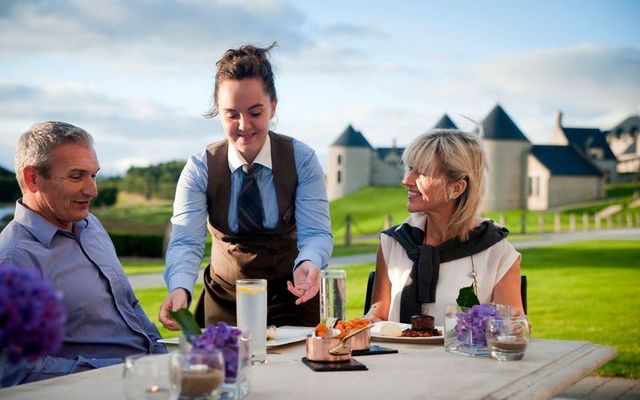 A couple dining al fresco in Fermanagh. 