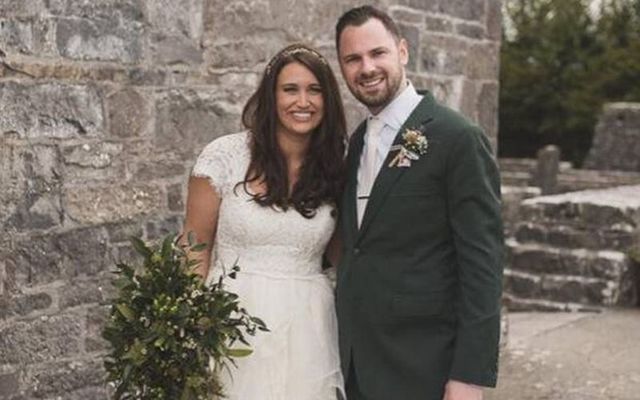 Caitlin Holtzman and John Heneghan on their wedding day: The couple were killed in a fatal road crash on May 25. 