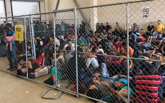 Men and young children share the same \"pod\" at a detention center with hardly enough room to stand and no amenities.