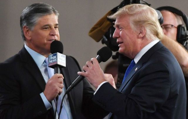 Fox News Channel and radio talk show host Sean Hannity (L) interviews U.S. President Donald Trump before a campaign rally at the Las Vegas Convention Center on September 20, 2018, in Las Vegas, Nevada. 