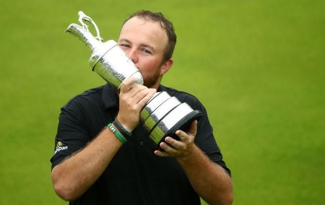 Open Champion Shane Lowry of Ireland celebrates with the Claret Jug on the 18th green during the final round of the 148th Open Championship held on the Dunluce Links at Royal Portrush Golf Club on July 21, 2019, in Portrush, United Kingdom.
