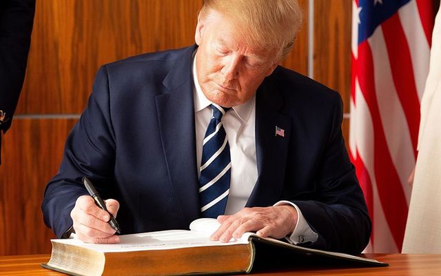 MI Donald Trump signing the visitor\'s guest book at Shannon Airport, in June 2019.