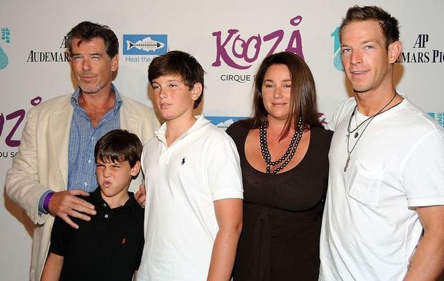 Actor Pierce Brosnan (L) and family arrive for the Cirque Du Solei Opening Night Gala For Kooza at the Santa Monica Pier on October 16, 2009, in Santa Monica, California.