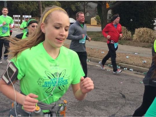 Cameron Gallagher running in the Virginia Beach Shamrock half Marathon. She collapsed after crossing the finish line and later died at an area hospital.