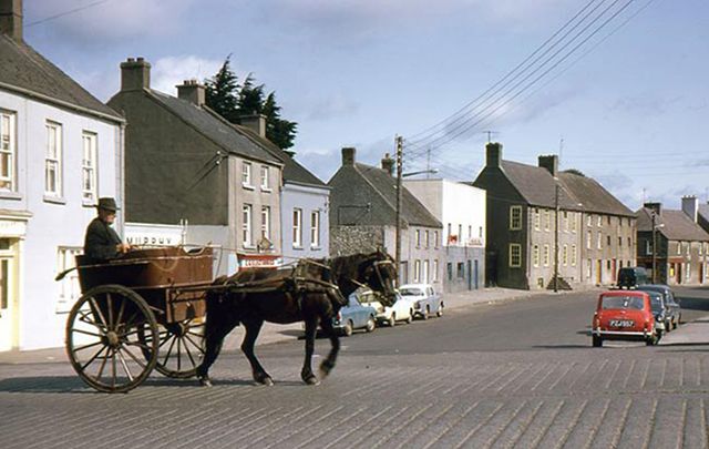 A horse and trap crossing Bridge Street, Graiguecullen, Co Carlow.