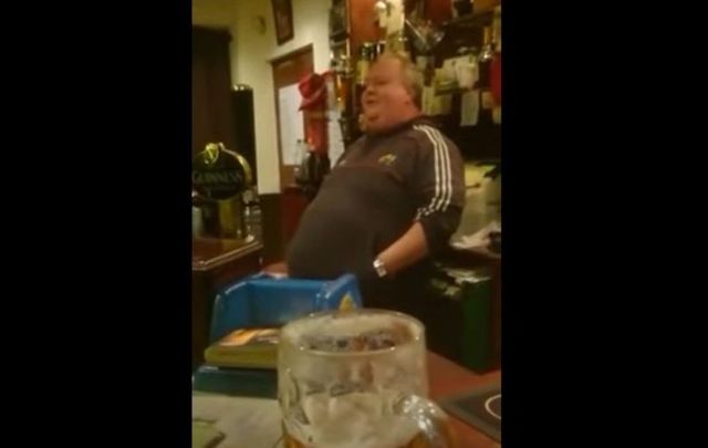 Cork barman John Horgan sings Mary Black\'s “Bright Blue Rose” as he serves his patrons.