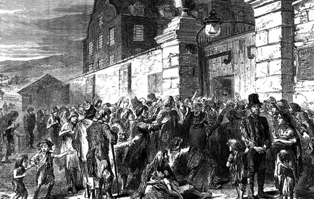Crowds outside a workhouse during the Famine: Study of remains in largest mass grave paints picture of lower classes. Major archaeological study sparks international interest.