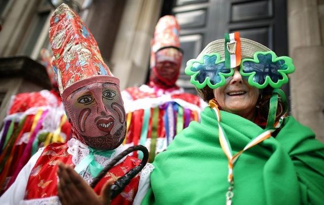 Members the Montserrat Emerald United Club get ready to take part in a St Patrick\'s day parade on March 18, 2012 in London, England