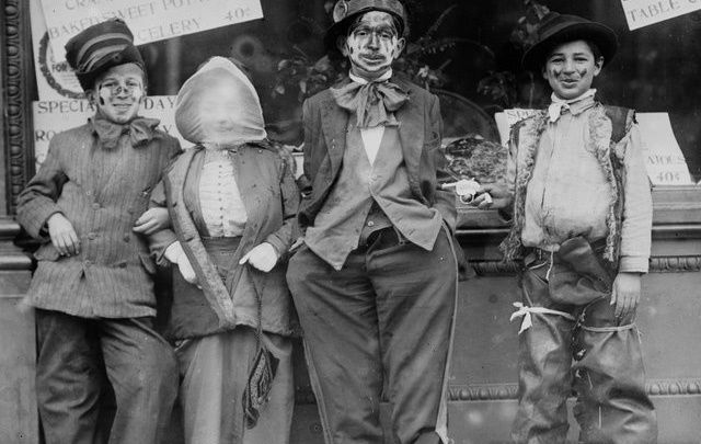 Some Thanksgiving Ragamuffins on Ragamuffin Day, photographed circa 1910 to 1915. Not so different to our Halloween. 