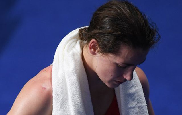 Katie Taylor crushed by her Olympic defeat yesterday.