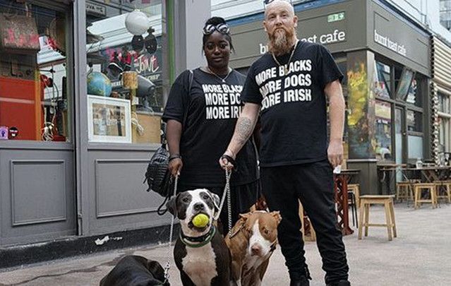Richy O’Gorman and Taurayne McKen and their "More Blacks, More Dogs, More Irish" t-shirts.