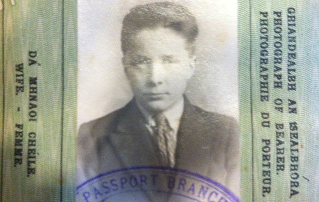 My grandfather\'s passport from when he left Ireland. Decades later there would be a parallel universe of relatives wondering if they\'d ever meet us or see my grandfather again.